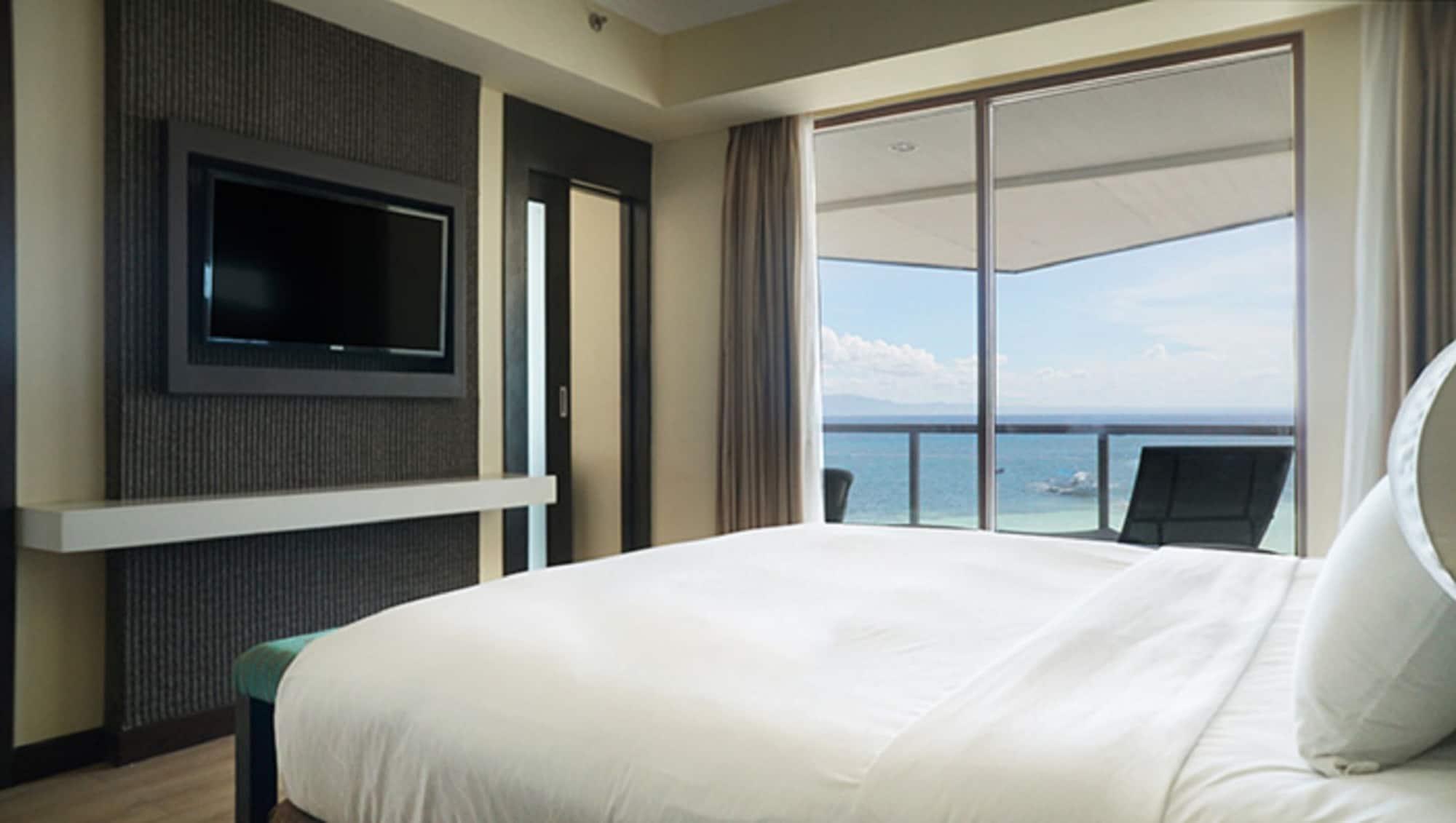 The Bellevue Resort Panglao Exterior foto A bedroom at the hotel